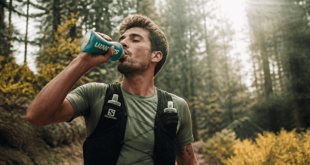 gourde pour course a pied coureur foret